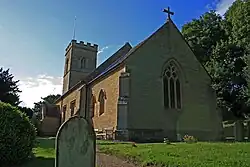 Stone church building with square tower