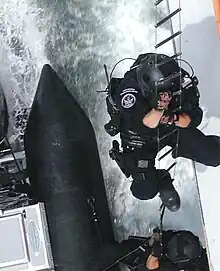 Maritime Security Response Team hook and climb onto a target