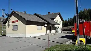 Two-story building with gabled roof