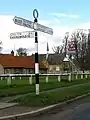 Signpost near School in centre of Hovingham