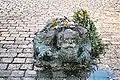 Statue of kneeling Jew, located at the base of the Monument against War and Fascism, Albertinaplatz