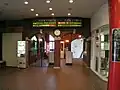 Ticket gate and steps leading down to the platforms.