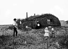 Image 9Norwegian settlers in front of their sod house in North Dakota in 1898 (from North Dakota)