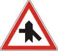 A-036Merging traffic on right and side road with priority on left