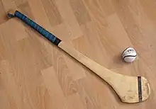 Image 21Hurling ball (sliotar) and hurley (camán) (from Culture of Ireland)