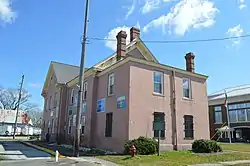 Former county courthouse, with the current courthouse at right