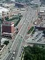 Looking north along Interstate 44, with the interchange for the west end of the bridge in the middleground