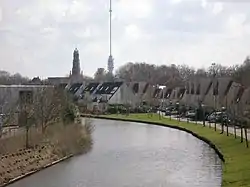 Hollandse IJssel through IJsselstein with church and Gerbrandy Tower in background