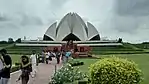 The Lotus Temple was designed by Faribohrz Sahba and completed in 1986. Its design was inspired by the shape of a lotus.