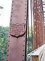 This image shows the plate put up by the Keystone Bridge Company on the one span of the bridge which is circa 1880.