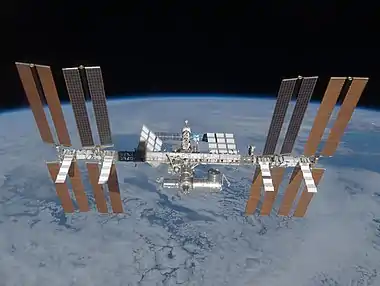 The space station, showing the completed truss assembly (as of March 2009)