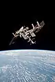 Photo of the ISS and Endeavour taken from Soyuz TMA-20.