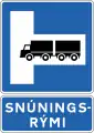 Place for turning on right - Signs indicating large vehicles may be turned around, e.g. in tunnel. Further information is provided on an additional sign below.