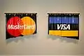 "MasterCard/Visa (If it wasn’t for plastic money I wouldn’t have any money at all)", 54" x 43", poured acrylic, Tyler Turkle, 2006
