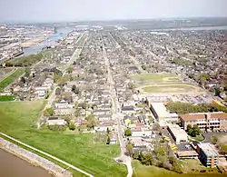 Aerial view of part of the Lower 9th, c. 1990s. Holy Cross School at lower right.