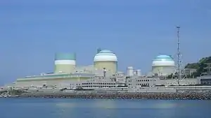 Image 41The Ikata Nuclear Power Plant, a pressurized water reactor that cools by utilizing a secondary coolant heat exchanger with a large body of water, an alternative cooling approach to large cooling towers (from Nuclear power)