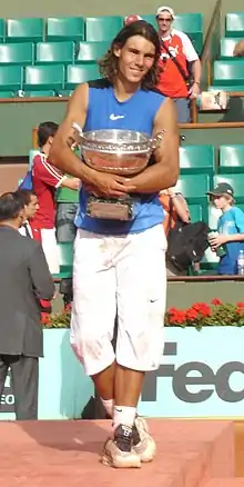 Image 52Rafael Nadal holding the Coupe des Mousquetaires in 2006. (from French Open)