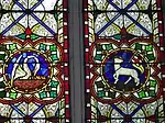 Pelican vulning and Lamb of God with flag with Triumphal cross, both symbols of the Resurrection (stained glass, Ireland, 19th century)