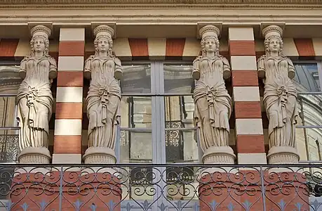 Neoclassical white terracotta caryatids on the Virebent Factory, Toulouse, France, unknown architect, 1840