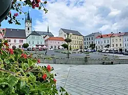 Town square with the Church of the Assumption of the Virgin Mary in the background