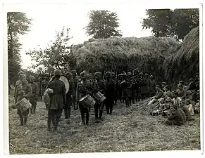 Infantry band of the 40th Pathans playing on a French farm