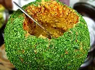 Ragda curry contained in a giant dry ball of ragda