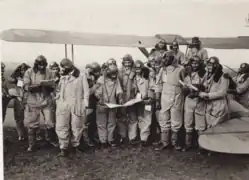 At Prestwick, Dutt second from right in front row holding a map