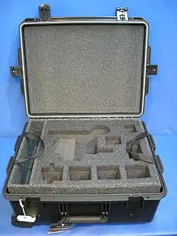 Plastic molded transit case with pre-cut foam interior