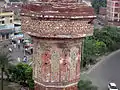 A view of Chauburji's minarets with tile work