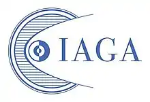 Stylized line drawing of circles symbolizing orbits in the Solar System, with letters "IAGA" to the right. Dark blue lines on white.