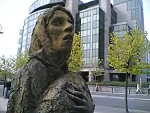 Image 9A memorial to the Great Famine (Ireland), a famine event in Ireland that faced elongated suffering from the UK's domestic policy failures at the time under the Prime Ministers Sir Robert Peel and Lord John Russell.  (from Health politics)