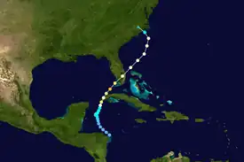 Colored dots superimposed on white line passing over green land masses and blue water bodies