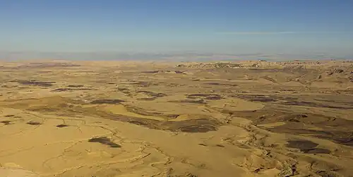 Image 7An aerial view of Makhtesh Ramon, a geological feature of Israel's Negev desert. Located some 85 km south of the city of Beersheba, the landform is not an impact crater from a meteor nor a volcanic crater formed by a volcanic eruption, but rather is the world's largest "erosion cirque" (steephead valley or box canyon).