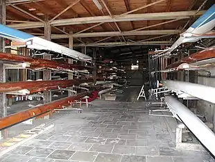 Racing shells stored inside a boathouse in Israel