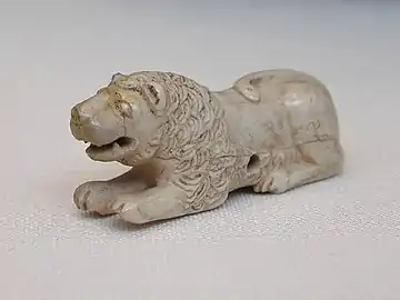 Old Kingdom gaming piece of ivory. Set of 6, 3 lions, and 3 bulldogs; Abu Rouash, Tomb M, 1st Dynasty, 3.5 × 6.5 cm, Cairo Museum