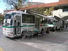 A bloodmobile of Japanese Red Cross at Myōdani Station in Suma-ku, Kobe, Hyōgo Prefecture, Japan