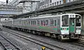 A pair of 719-0 series sets at Koriyama Station in March 2007