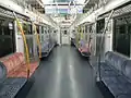 The interior of refurbished 811-1500 series car MoHa 811-1504 of set PM1504 in September 2017