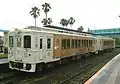 The Umisachi Yamasachi tourist train at Aoshima Station, June 2010.