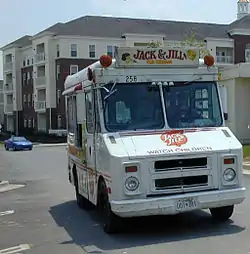  A van which says "watch children" on the front