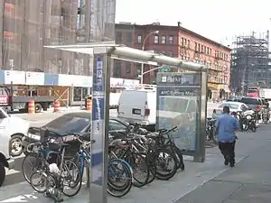 Parking under a bike shelter in Long Island City near Pulaski Bridge