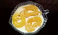 Jalebi dipped in rabri