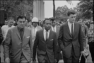 Doar (right) and U.S. marshals escorting James Meredith to class at the University of Mississippi