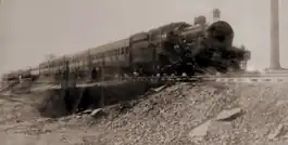 Long train crossing a viaduct