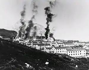 Image 23Buildings burning after the first Japanese attack on Dutch Harbor, June 3, 1942. (from History of Alaska)