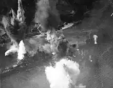 under attack by U.S. Navy carrier aircraft, 28 July 1945 at close range.