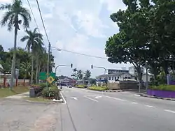 Traffic lights at a street in Jasin town, the former headquarters of the Municipal Council is on the right.