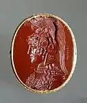 Intaille rouge avec tête de femme casquée