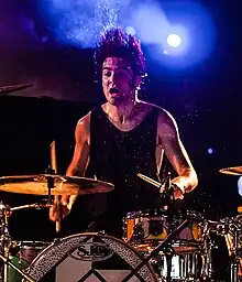 Weinberg performing with Against Me! in 2012