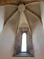 The rib vault of the presbytery with a smooth keystone